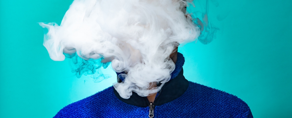 Man Exhales Vape Cloud