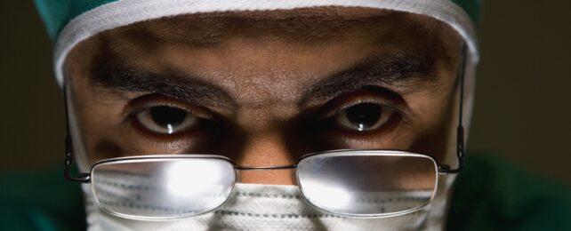 Surgeon WIth Mask Wearing Glasses
