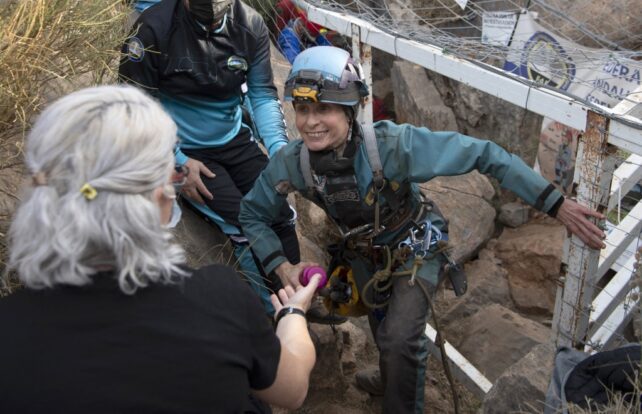 Women emerges after 500 days isolated in a cave.