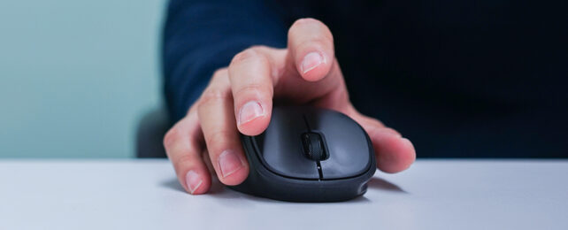 hand on a computer mouse