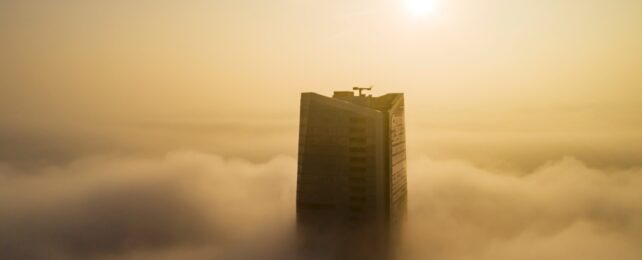 Skyscraper In Fog