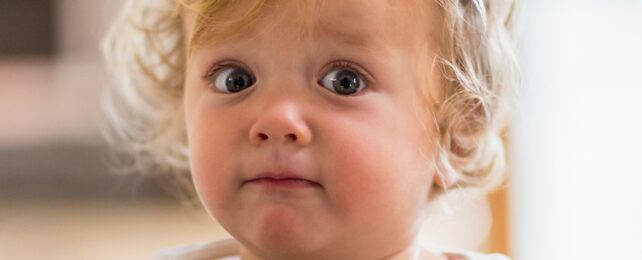 Surprised Baby With Blonde Hair