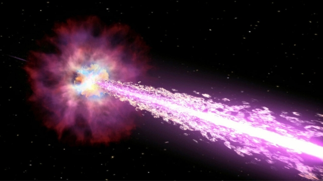 An artist impression of a gamma-ray-burst seen as a bright purple flash into the foreground, out of light area in the background.