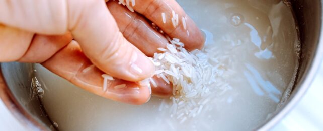 Hand Washing Rice In Tub