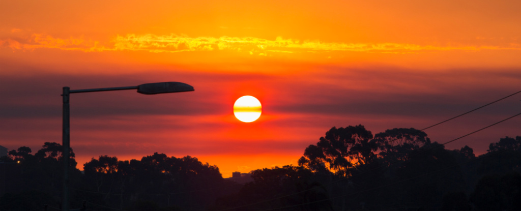 Red sun on hot day