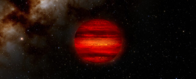 An illustration of a brown dwarf star near a nebula.