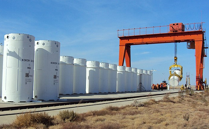 large cylindrical containers outdoors for nuclear waste containment 