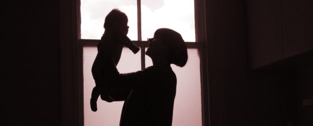 Mum Holds Newborn Baby