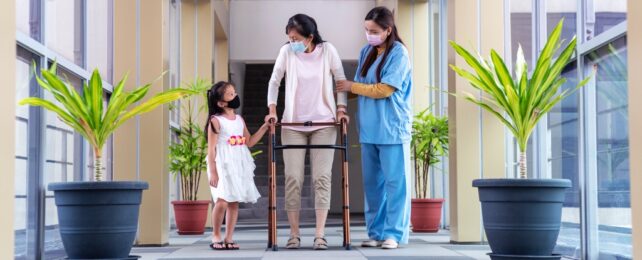 Patient Uses Walking Frame