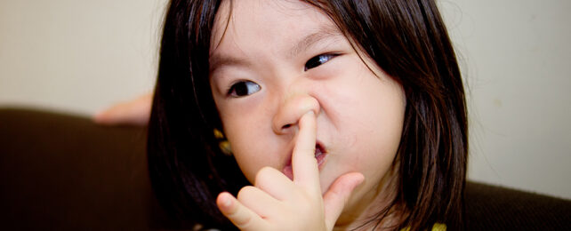 Girl picking nose