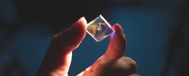 Hand Holds Square Crystal