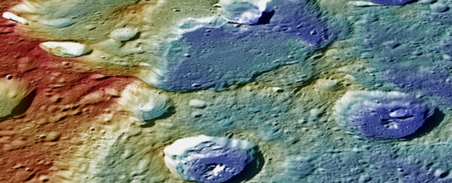 false colour image of crater and fault on Mercury
