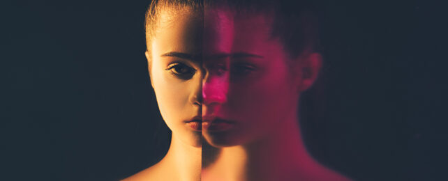 multiple exposure of a woman's face on a dark background