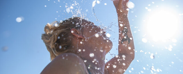 Pouring water on a head