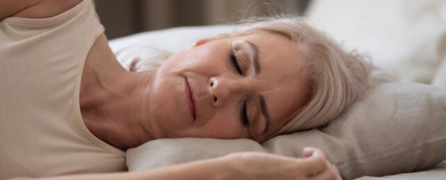 Senior person sleeping in daylight