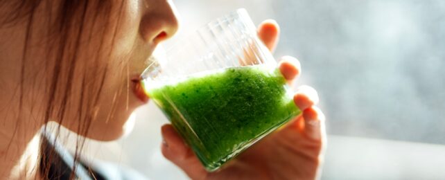 Woman Drinks Green Drink