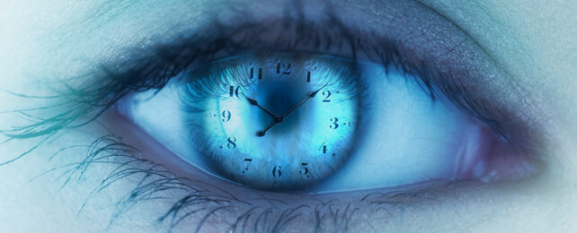 clock face superimposed over an eye