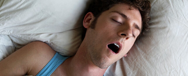 man sleeping with mouth open