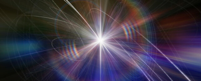 Artist concept of the Higgs Boson, depicted as a point of bright light in darkness.