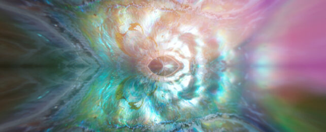 Abstract image of colourful gas-like substance reflected upon itself.