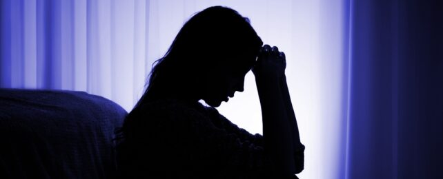 Silhouette of Depressed Woman
