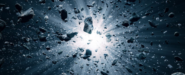 blast in space surrounded by small rocks