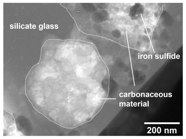 black and white image showing carbonaceous material in sample