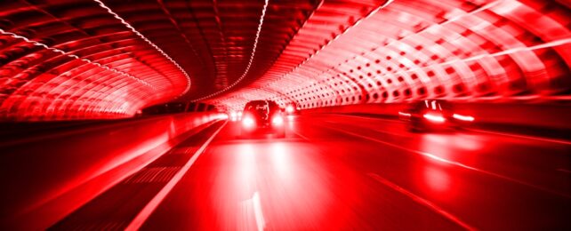 Cars In Tunnel Appear In Red Light