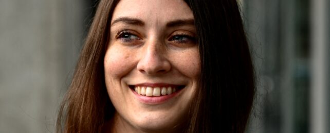 Woman Smiling With Brown Hair