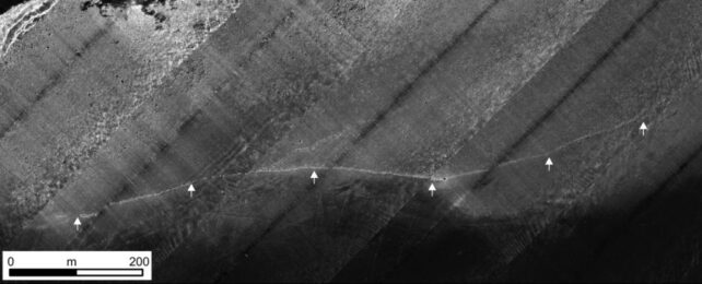 Undersea morphology of the region, collected using a remote vehicle. White arrows point to the Blinkerwall.