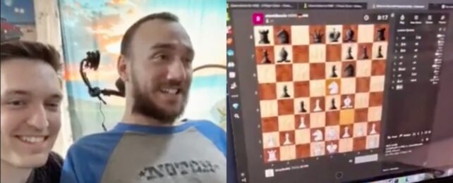Two men smiling and a chess board