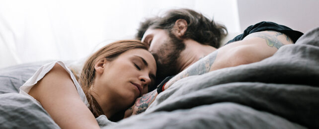 couple sleeping in bed