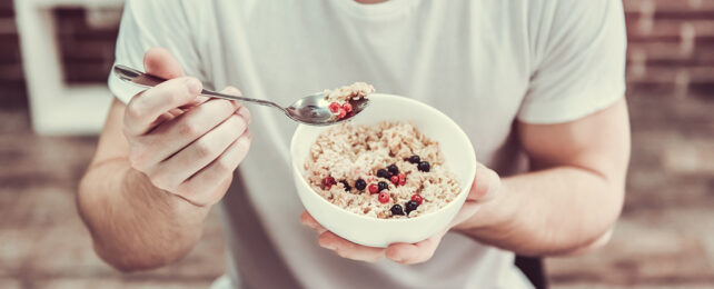 man eating porridge