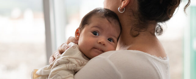 Mother holding baby