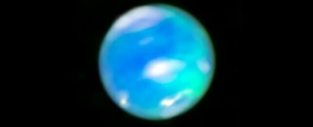 First-Ever Images of Neptune's Eerie Glow Finally Reveal Missing Aurora