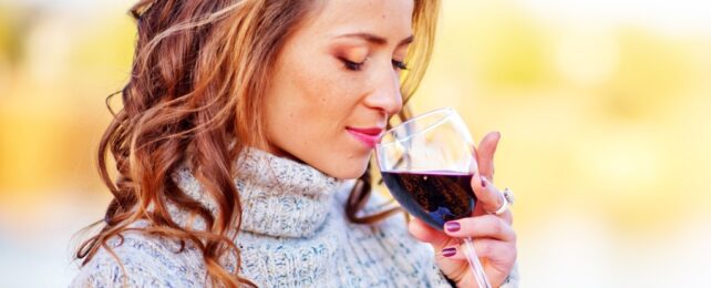woman sipping wine