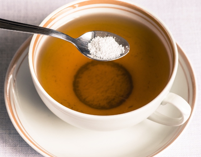 Cup of tea with sweetener