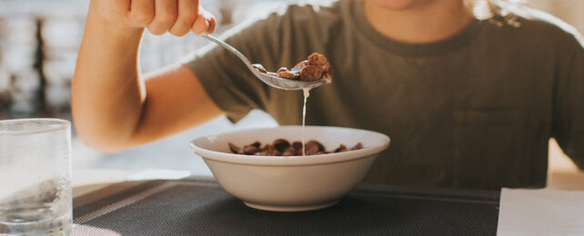 Boy eating a bowl of cereal