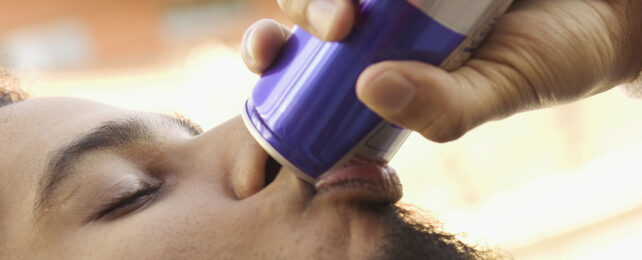 Man drinking an energy drink