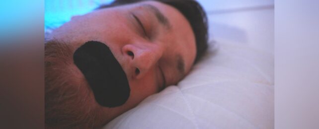 Mouth Taped Sleeping Man