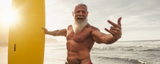old man surfing
