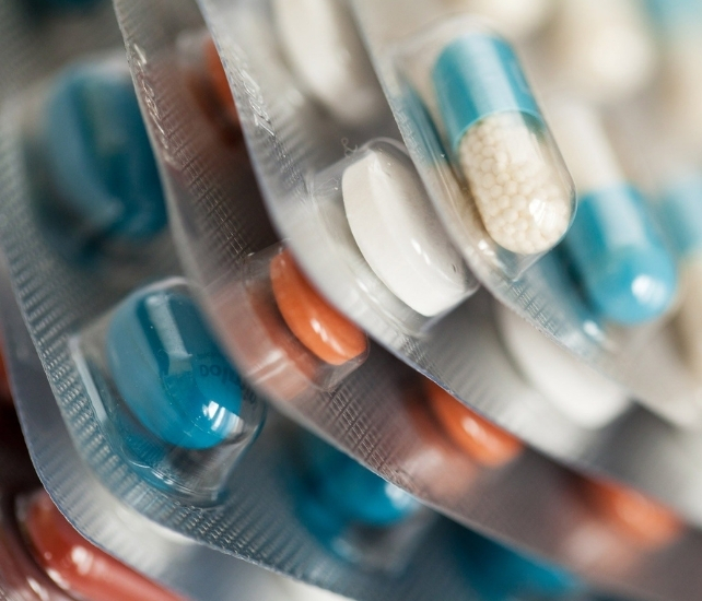 Different types of tablets or pills in foil packs