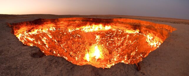 A burning fire in a huge pit