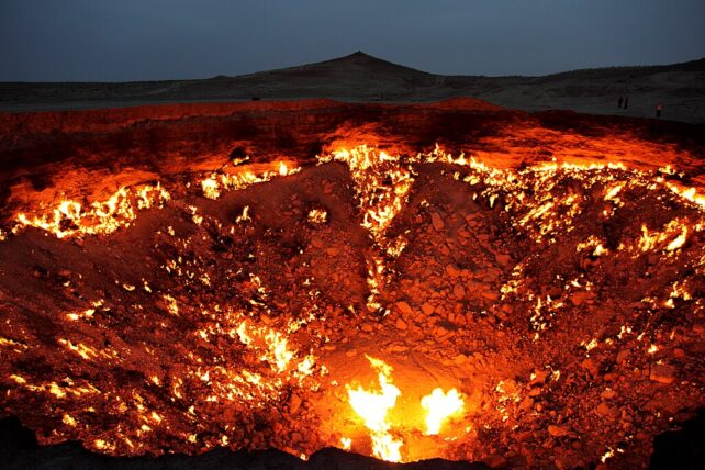 A fire burning in a crater