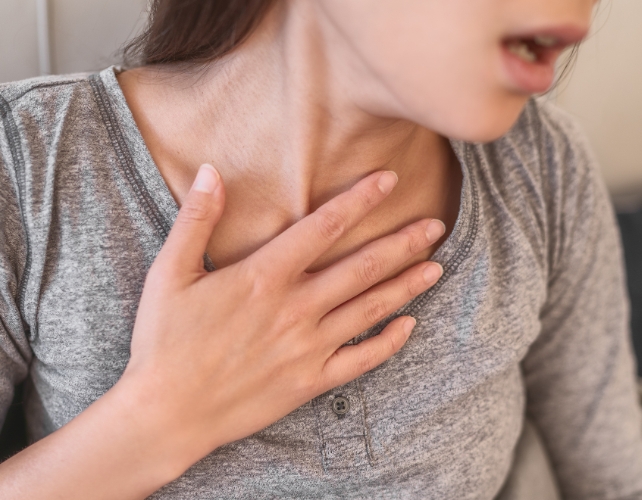 person struggling to breathe
