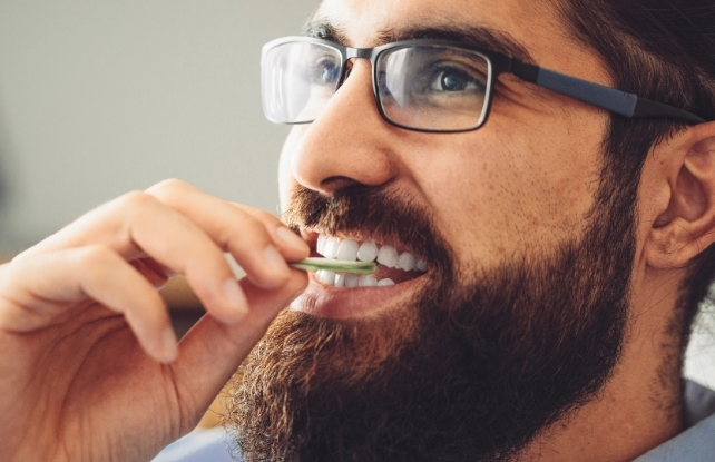 man eating chewing gum