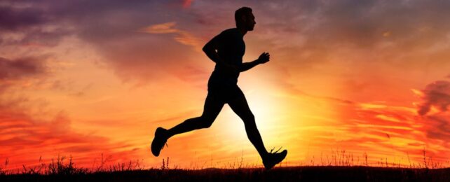 man running at sunset