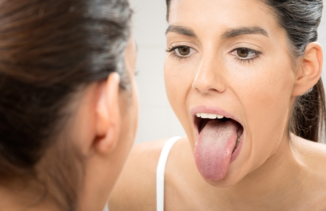 woman poking out tongue