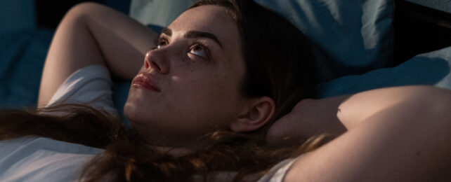 woman laying awake