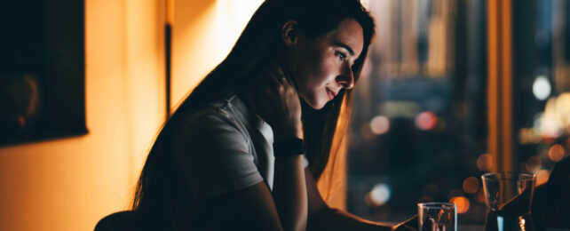 woman working at night on her laptop